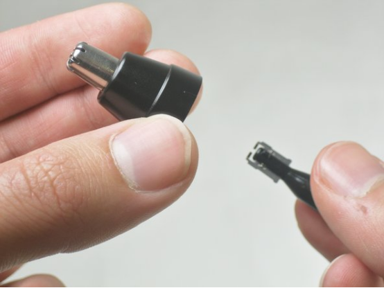 This close-up shows the precision-cutting blade component that powers the science behind your nose hair trimmer.